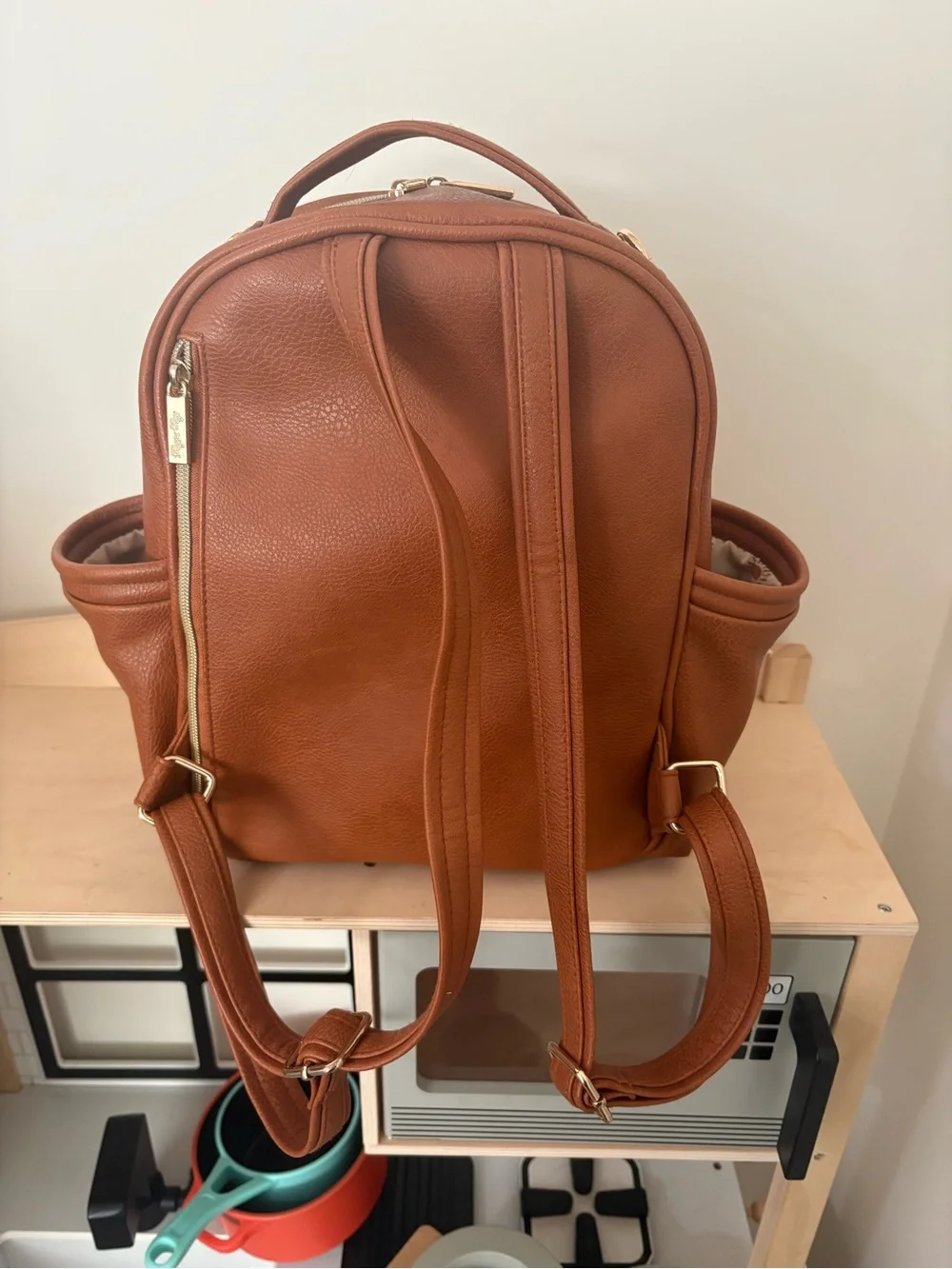 Itzy Ritzy Mini Boss Diaper Bag + Boss Pouch Bundle | Cognac Faux Leather